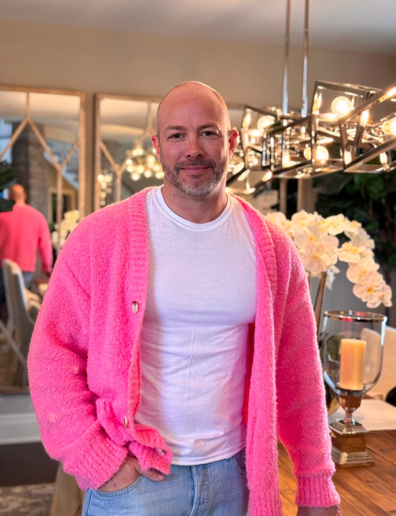 Ryan Campbell, Broker, in his signature pink cardigan